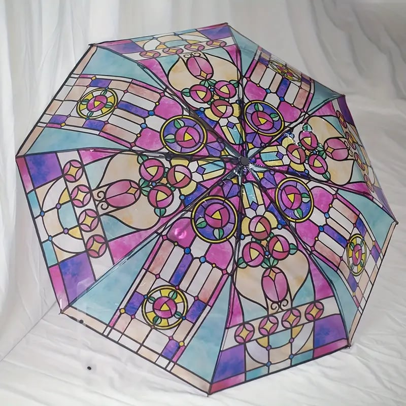 Vintage automatische paraplu met glas-in-loodmotief