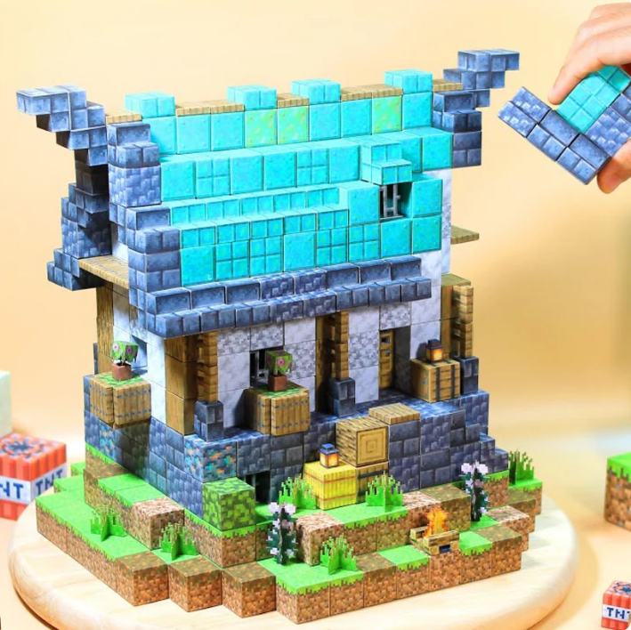 Wat als je kind zijn eigen pixelwereld zou kunnen bouwen... zonder scherm? 🎮✨